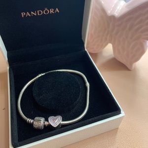Pandora bracelet with heart charm included